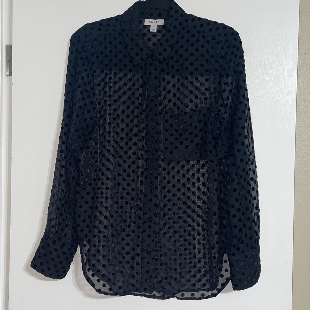 On the 34th long sleeve blouse